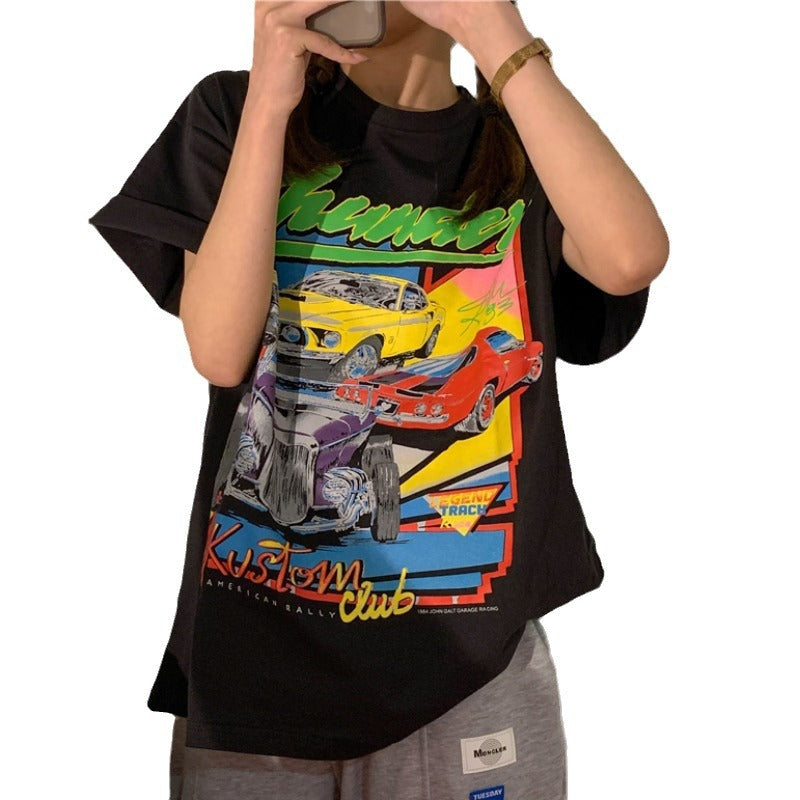 Dame Grafik T-shirt med kreativt automotivdesign og trendy snit Stilla