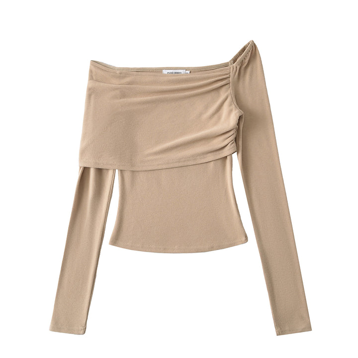 Dame asymmetrisk top med flæsedetaljer og elegant snit Stilla