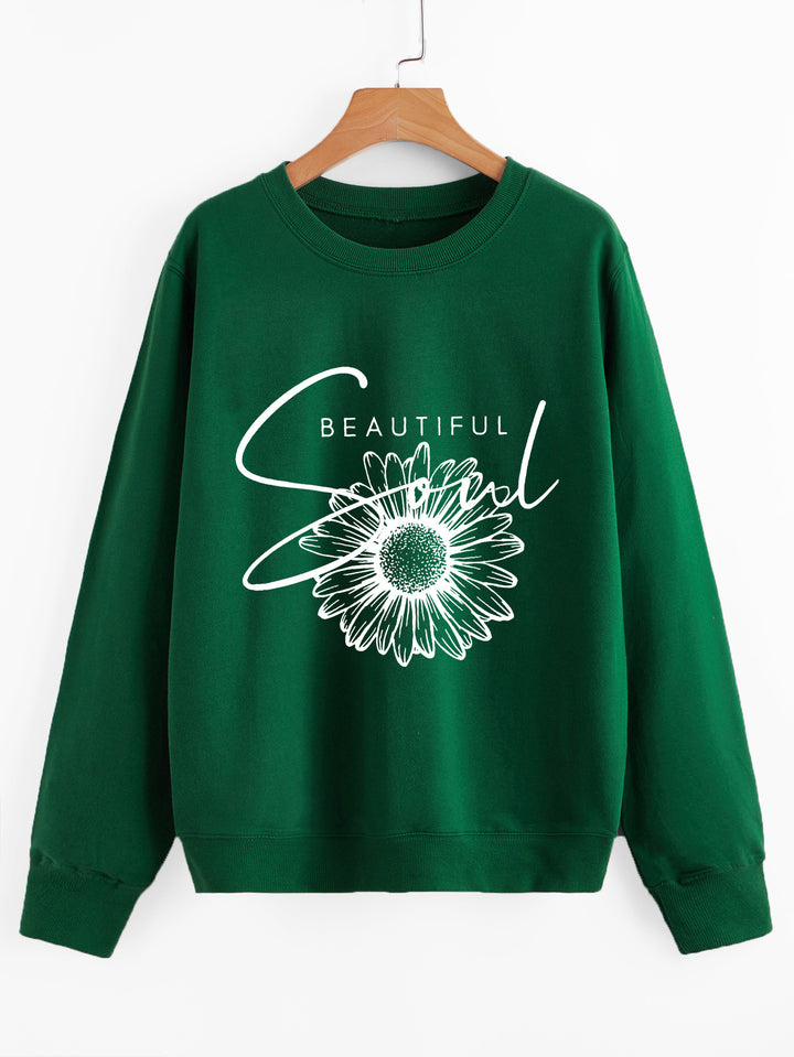 Kvindes sweatshirt med blomstermotiv og inspirerende tekst Stilla