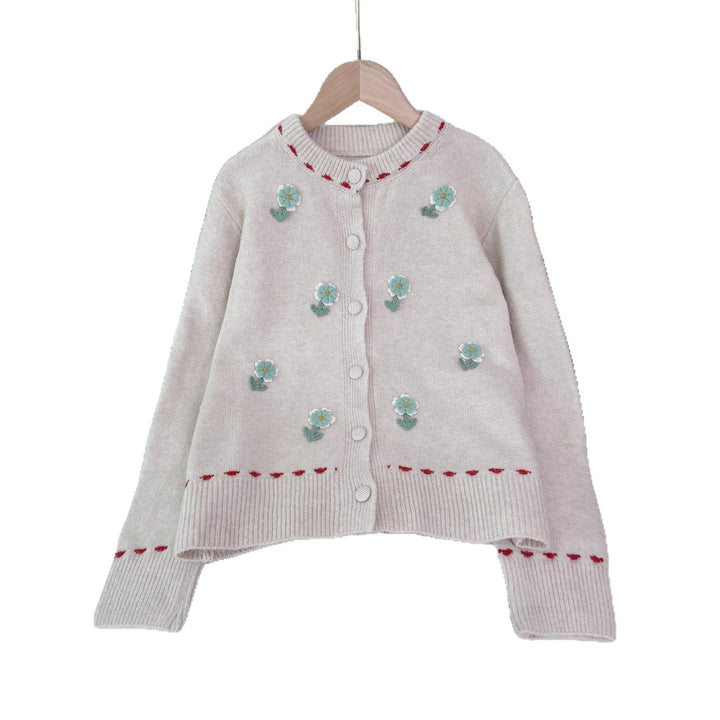 Dame cardigan med blomstret broderi design og knaplukning Stilla