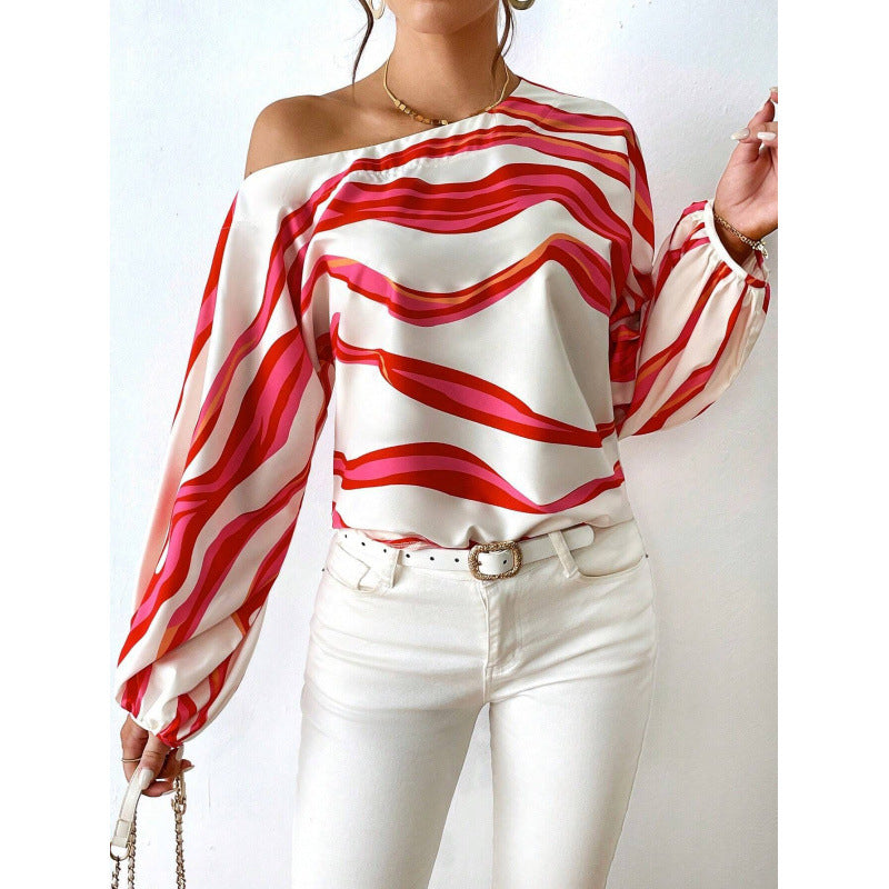 Femme Off-Shoulder Satinbluse med kraftigt stribemønster Stilla