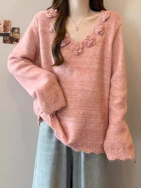 Kvinders store strikket sweater med blomsterapplikationer Stilla