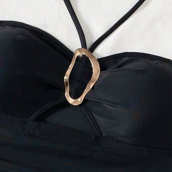 Damer Elegant Bandeau-badedragt med moderne cut-outs og stilfuldt smykkedetalje Skovae