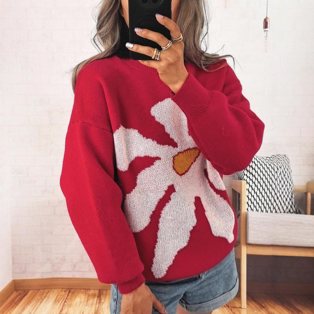 Kvinders afslappede strikket sweater med farverigt blomster mønster og sænkede skuldre Stilla