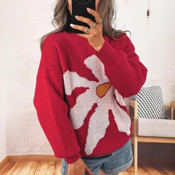 Kvinders afslappede strikket sweater med farverigt blomster mønster og sænkede skuldre Stilla
