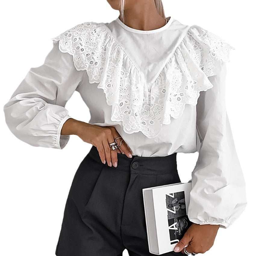 Damebluse med elegant spids og voluminøse ærmer Stilla