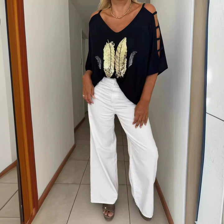 Dame Oversized T-shirt med kreative cut-outs og iøjnefaldende tryk Stilla