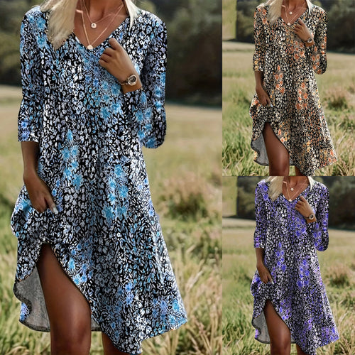 Dame afslappet midikjole med blomsterprint og asymmetrisk kant Stilla
