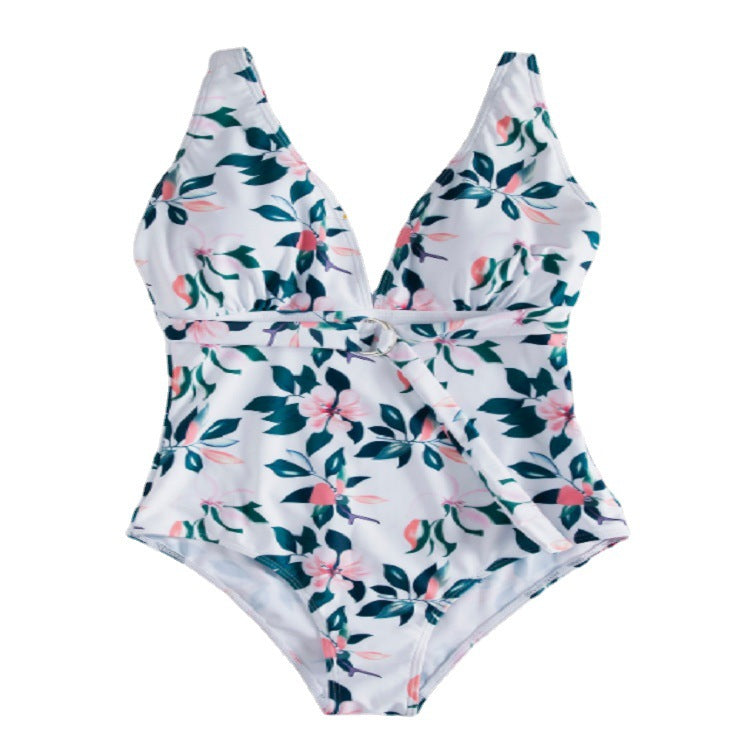 Dame én-delt badedragt med elegant snøre detaljer og floralt design Stilla