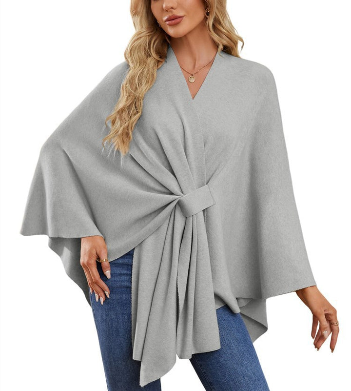 Dame elegant strikkeponcho med raffinerede draperinger og taljebælte Stilla