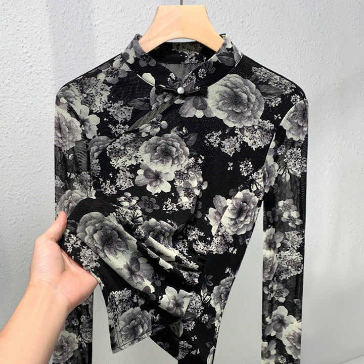 Dame elegant top med florale mønstre og raffinerede knapdetaljer Stilla