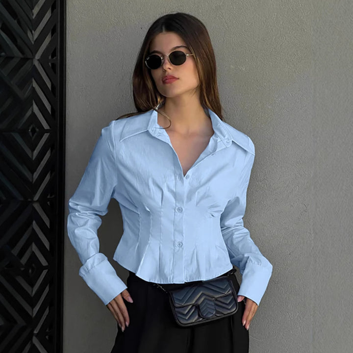 Dame Tailoreret Bluse med elegante knapdetaljer og velplejet design Stilla