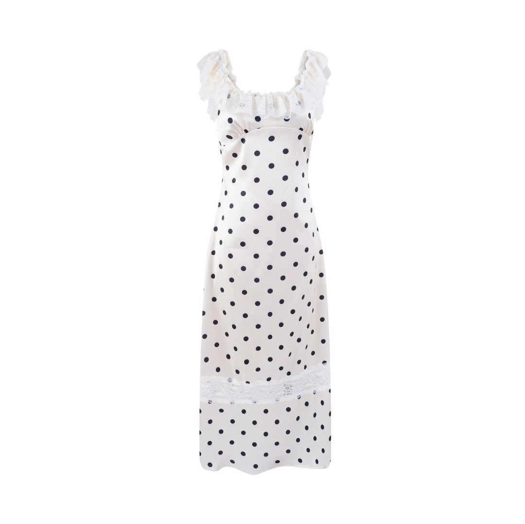 Dame polka-dot kjole med flæsedetaljer og spidse accenter Stilla