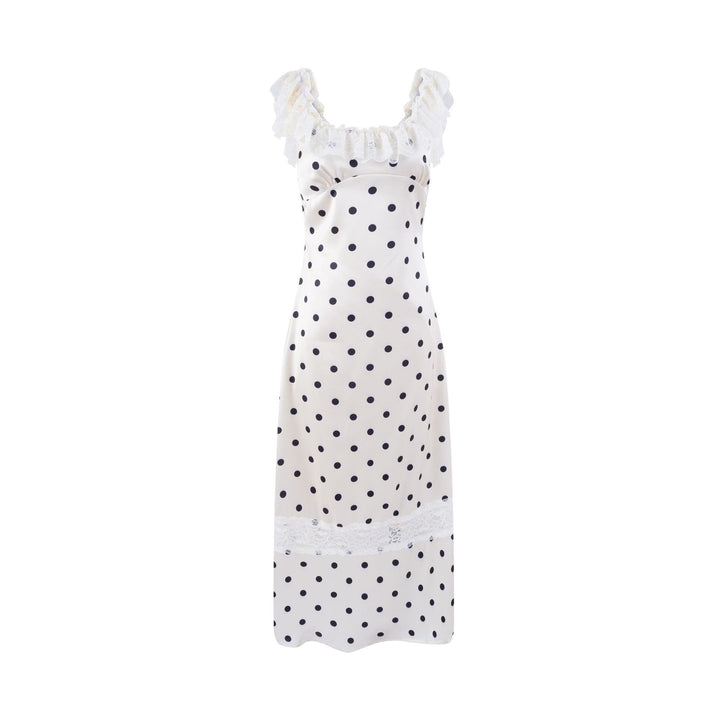 Dame polka-dot kjole med flæsedetaljer og spidse accenter Stilla