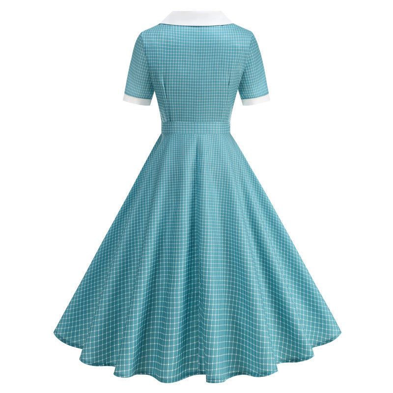 Dame Vintage Polka-Dot Kjole med knapdetaljer og svajende skørt Skovae