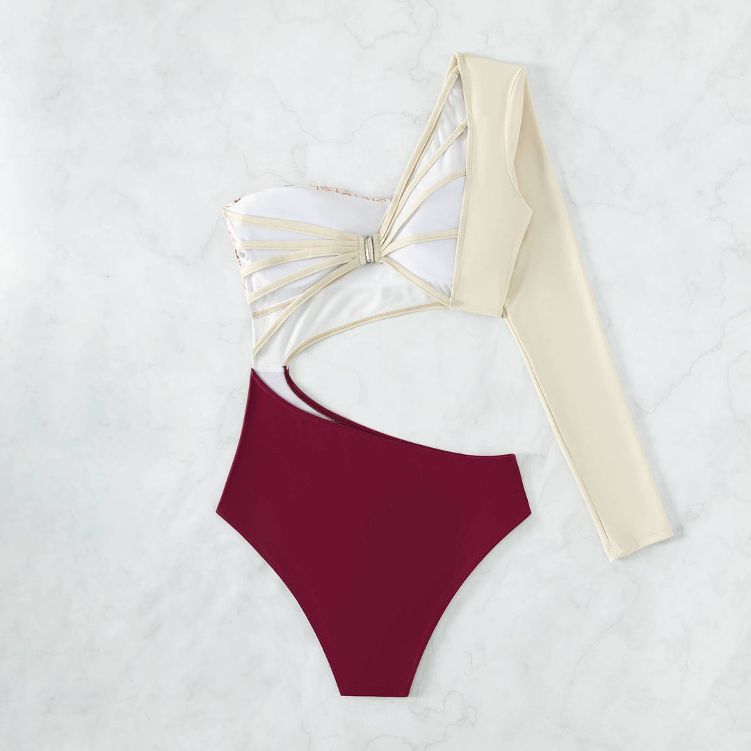 Dame enheder badedragt med asymmetrisk design og stilfulde cut-out-detaljer Stilla