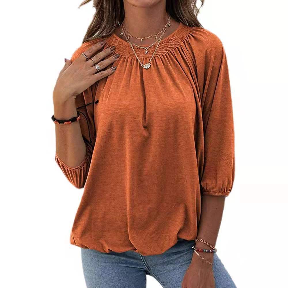 Dame afslappet bluse med casual snit og elastiske pufærmer Stilla