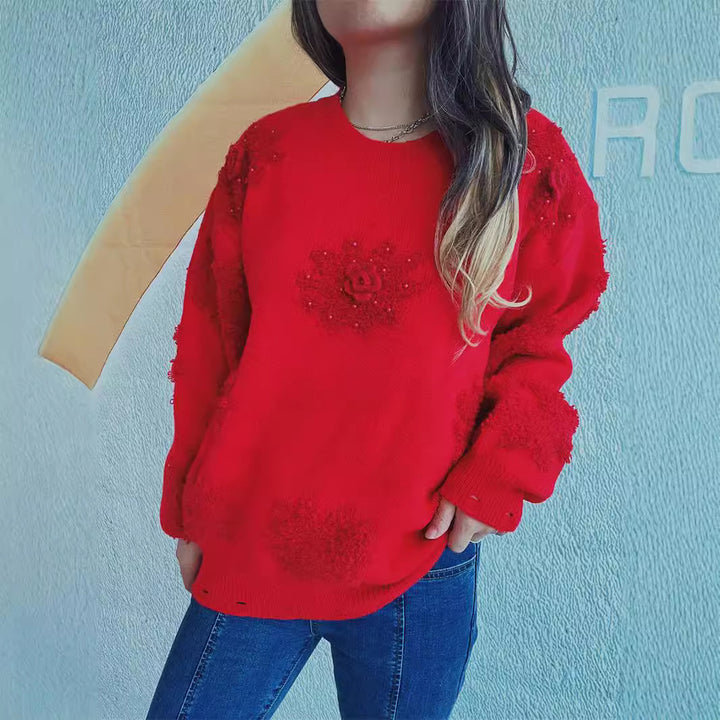 Kvindernes glade sweater med blomsterapplikationer og tekstureret strikdesign Stilla