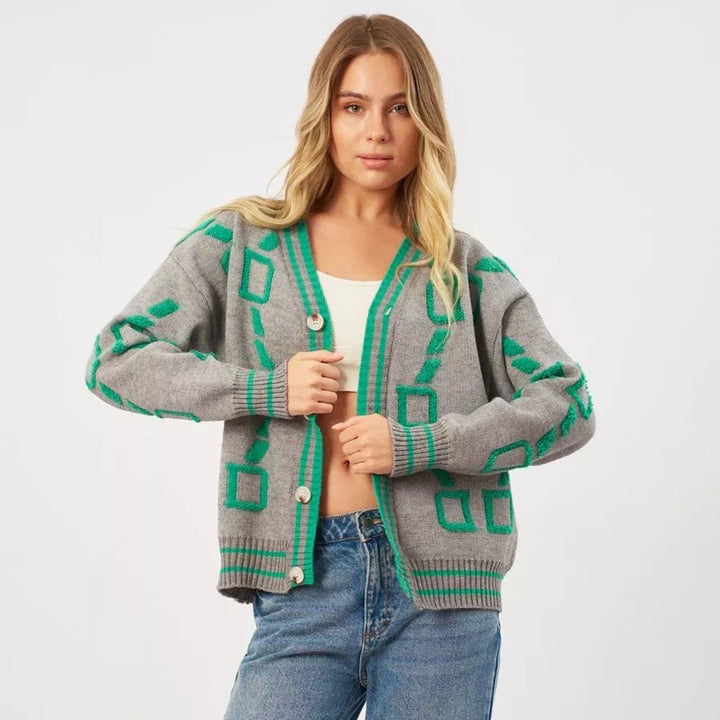 Kvindernes stilfulde cardigan med geometrisk mønster og knapstolpe Stilla