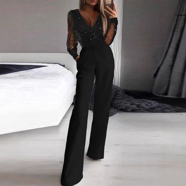 Kvinder Elegant Jumpsuit med Transparent Bluse og Glitrende Akcenter Skovae