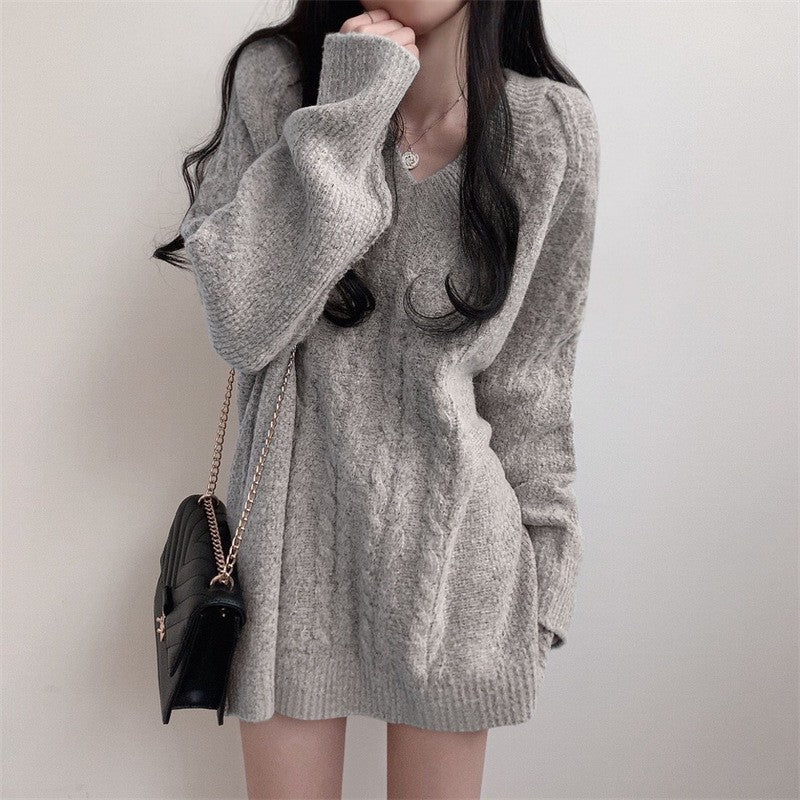 Kvindernes oversized strikket sweater med kabelmønster og V-hals Stilla