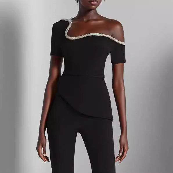 Dame off-shoulder top med raffineret flæse og elegant bukse-sæt Stilla
