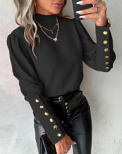 Dame stilfuld bluse med elegant knapliste og voluminøse ærmer Stilla