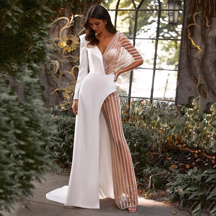 Dame Elegant Jumpsuit med asymmetrisk snit og glitrende accenter Stilla