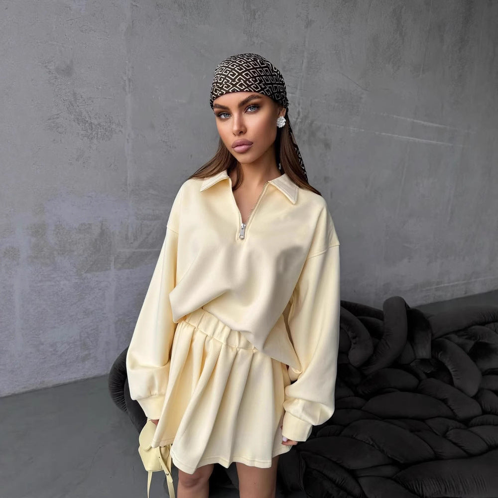 Dame sporty oversized pullover med kort lynlås og ribbede detaljer Skovae