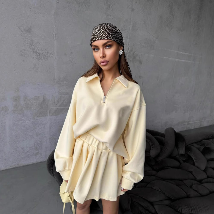 Dame sporty oversized pullover med kort lynlås og ribbede detaljer Skovae