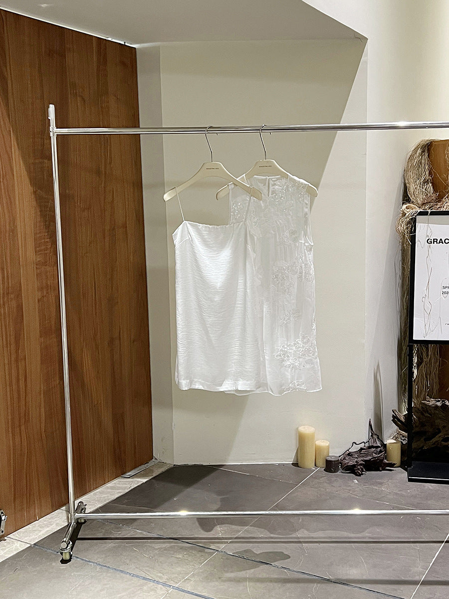 Dame Elegant ærmeløs kjole med fin broderi og luftig pasform Stilla