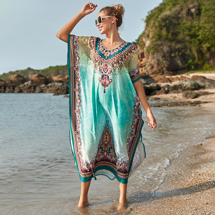 Dame transparent strandtunika med kunstnerisk mønster og elegante detaljer Stilla