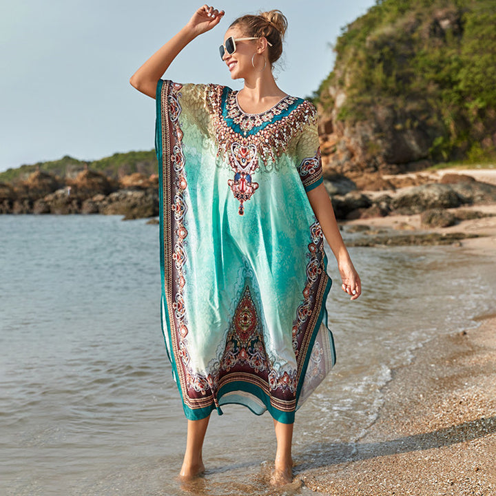 Dame transparent strandtunika med kunstnerisk mønster og elegante detaljer Stilla