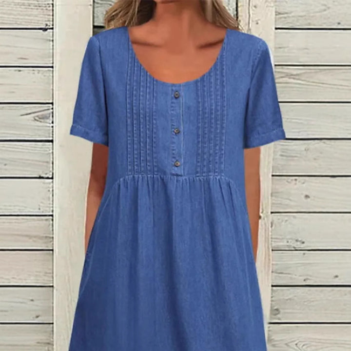 Dame nan locker siddende Midikjole i Denim-look med Rundhalsudskæring, brystfalsker og sidelommer Skovae