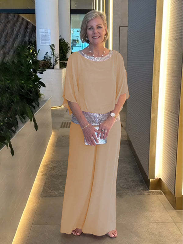 Dame elegant jumpsuit med flydende overdel og glitrende taljebånd Stiila