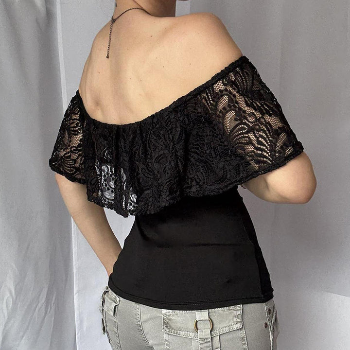 Dameoberdel med spidsel-overlap og off-shoulder design Skovae