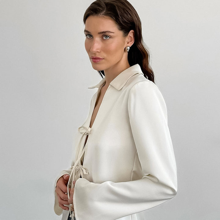 Damer elegant wrap top med moderne snortræk Stilla