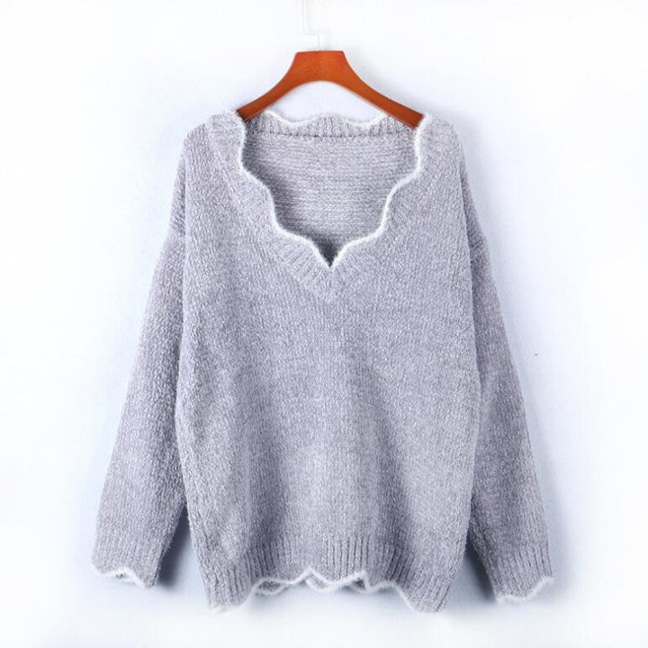 Kvinders bløde strik pullover med V-hals og bølget kant Stilla