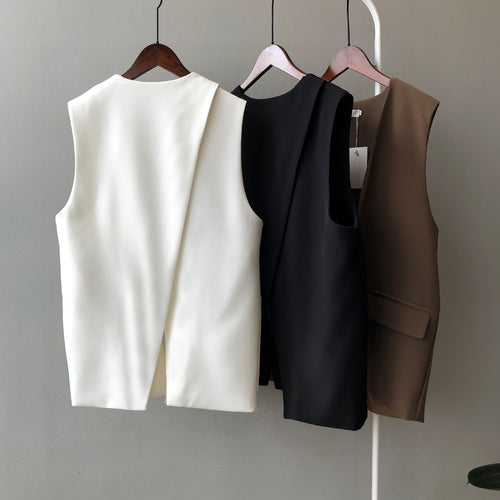Dame elegant vest med dyb V-udskæring og praktiske lommer Stilla
