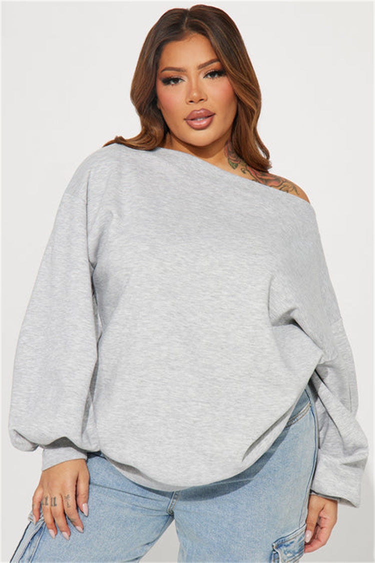 Kvinders oversized sweatshirt med asymmetrisk halsudskæring og ballonformede ærmer