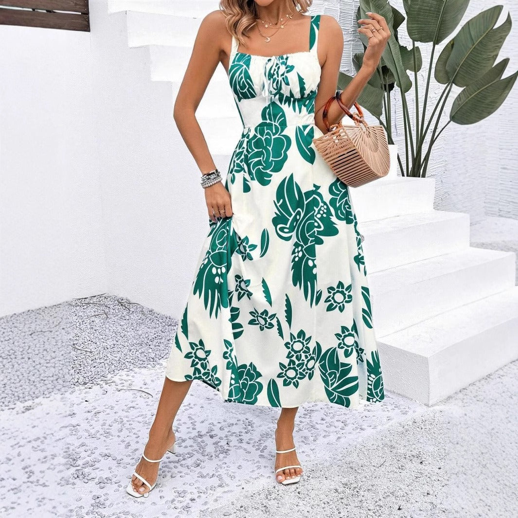 Dame sommermaxikjole med blomsterdesign og elegant bånd Stilla