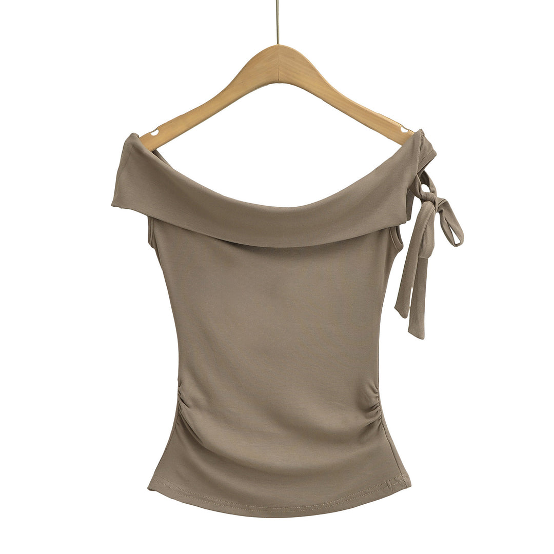 Dame Off-Shoulder Top med elegant omslagdesign og komfortabelt materiale Stilla