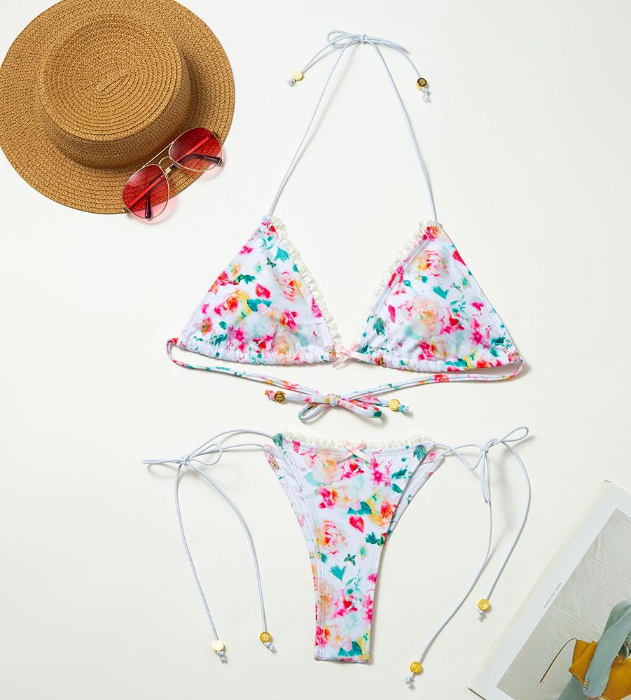 Dame triangel-bikini med blomsterprint og flæser Stilla