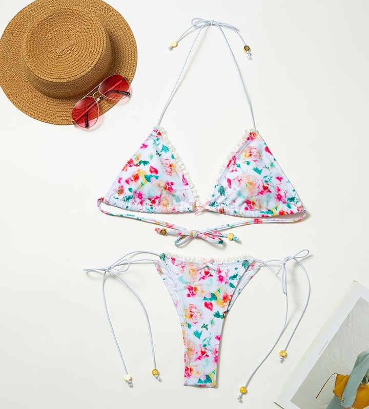 Dame triangel-bikini med blomsterprint og flæser Stilla