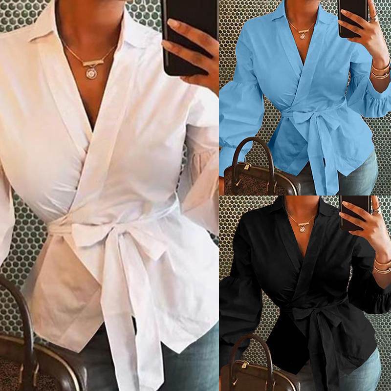 Dame indpakningsbluse med elegante pufærmer og taljebælte Stilla