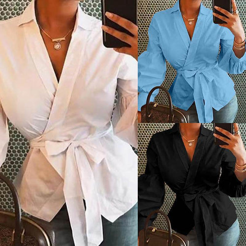 Dame indpakningsbluse med elegante pufærmer og taljebælte Stilla