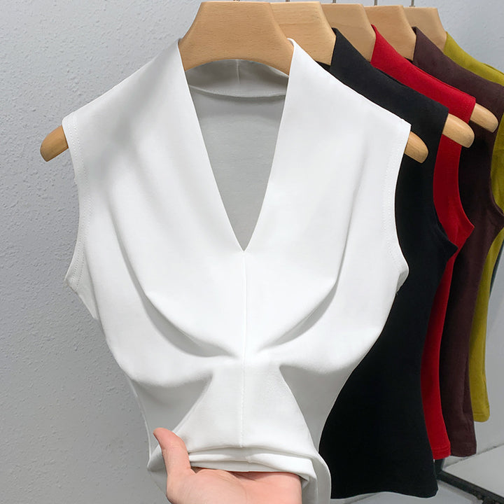 Dame ærmeløs top med elegant V-halsudskæring og figursyet design Stilla
