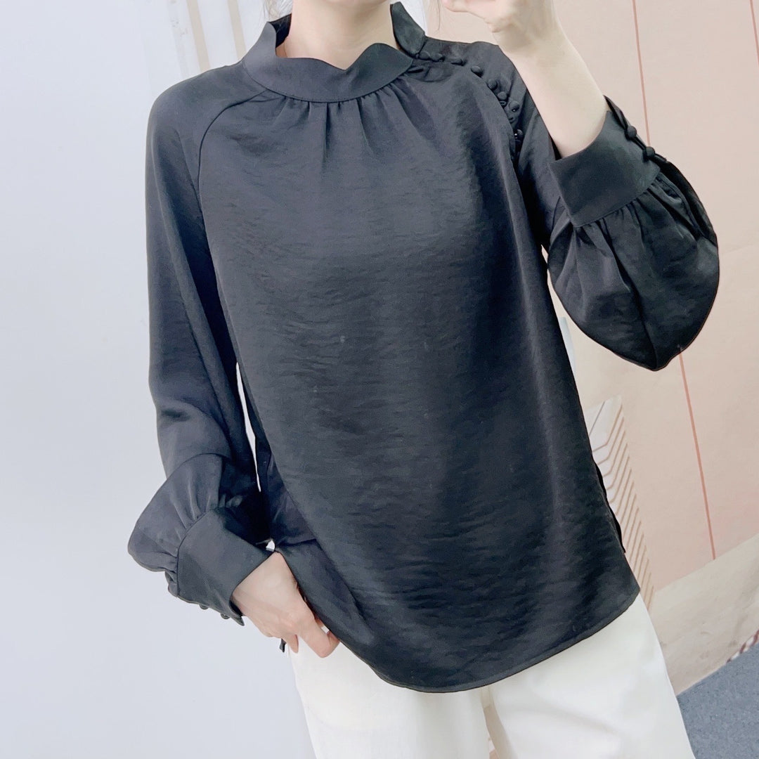 Damebluse med dekorative puffærmer og elegant ståkrave Stilla