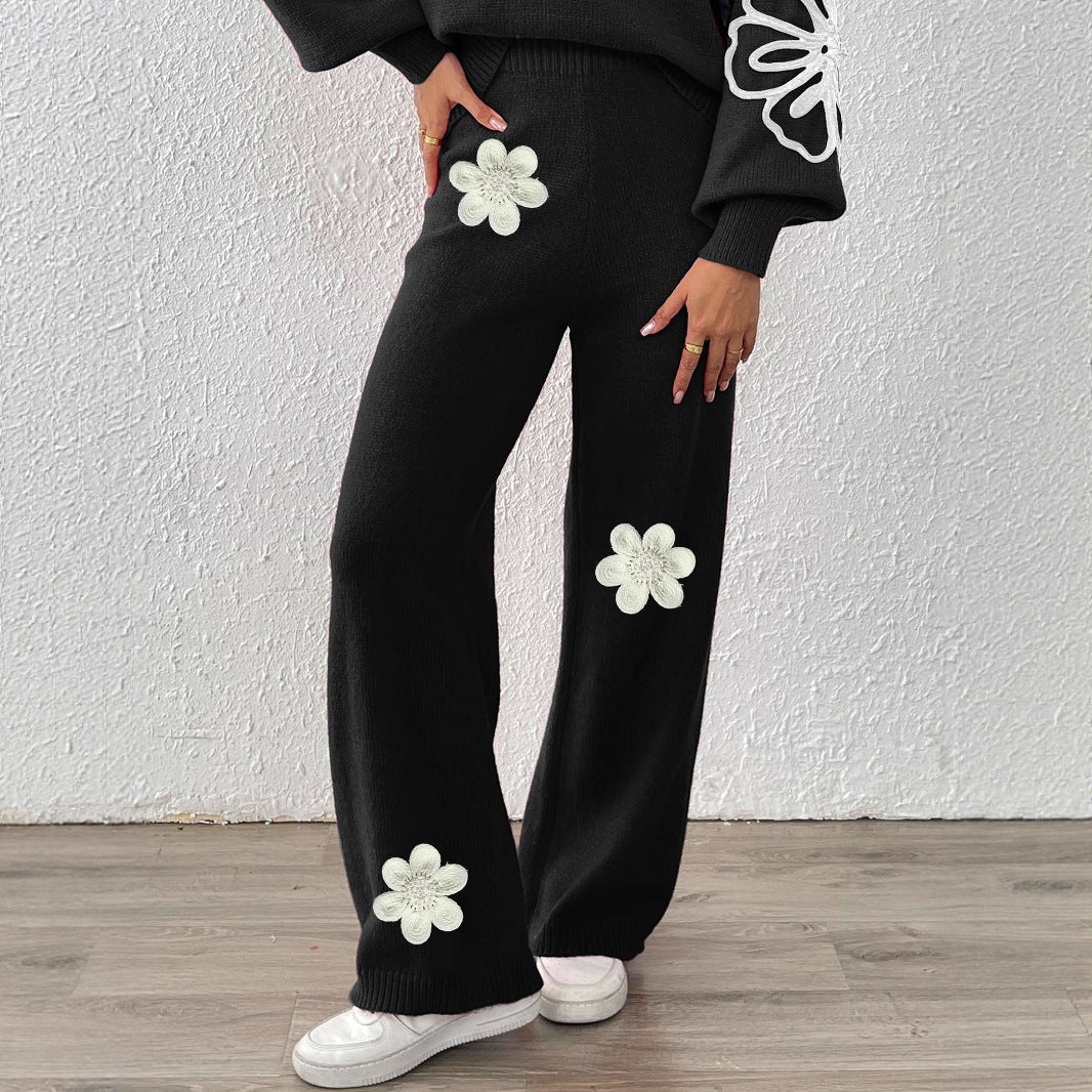 Dame strikbukser med blomstret design og bredt ben Stilla