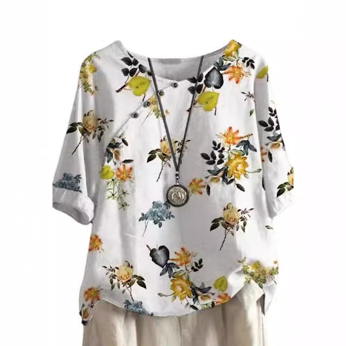 Damer bomuldsbluse med blomstertryk og elegant knaplukning Stilla